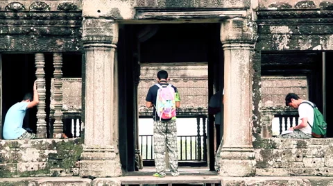 Tourists explore angkor wat complex Stock Footage 63180301