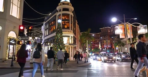 Tourists explore on Rodeo Drive in Beverly Hills, Los Angeles, California, 4K Stock Footage 83994889