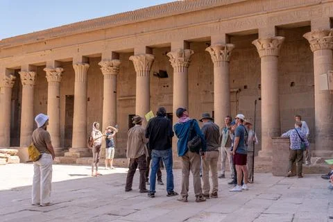 Tourists exploring ancient philae temple in egypt Stock Photos