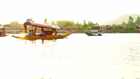 Tourists Exploring Dal Lake on Shikara  in Srinagar Kashmir India Editorial Stock-Footage 336479762