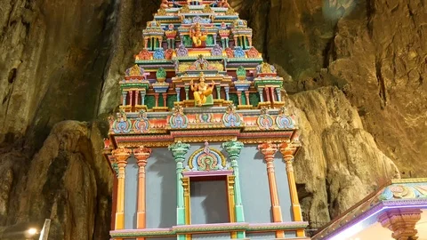 Tourists Exploring the Interior of the Sacred Batu Caves in Malaysia Stock Footage 124141162