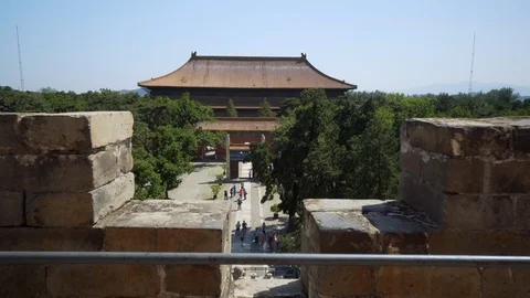 Tourists exploring Lingxing Gate amidst trees on sunny day - Beijing, China Stock Footage 117628474