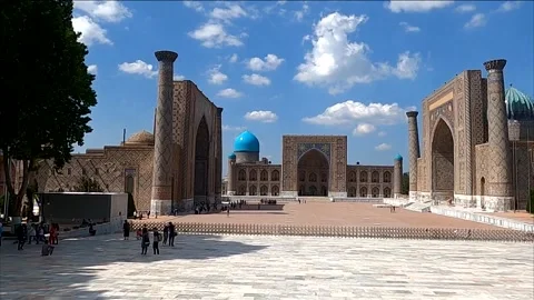 Tourists exploring the magnificent Registan Square ensemble in Samarkand Stock-Footage 336894924