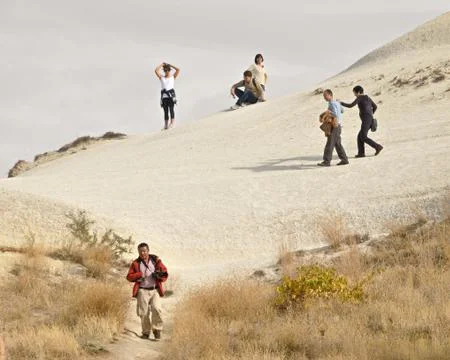 Tourists Exploring Monks Valley in Cappadocia Stock Photos