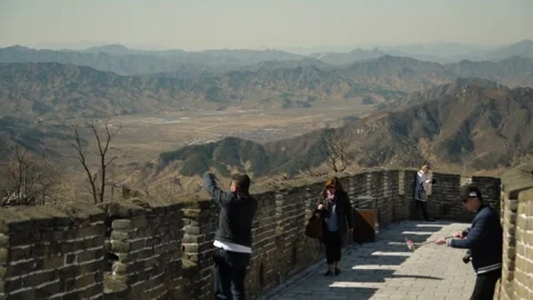 Tourists Exploring Mutianyu Great Wall Section with Mountain Views in Beijing Stock Footage 345824061