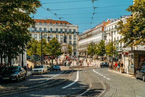 Tourists exploring square of Luis de Camoes in Lisbon Stock Photos
