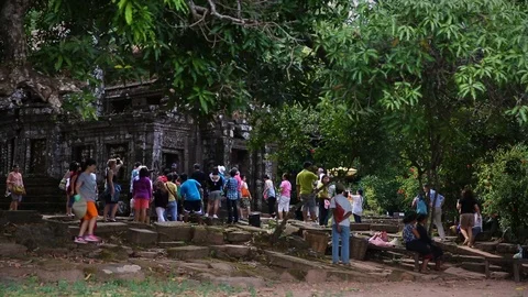 Tourists exploring Wat Phu temple in Laos Stock Footage 104120041