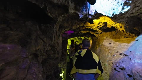 Tourists exploring world's largest underground rocky Drach Caves, Mallorca Spain Stock Footage 249311717