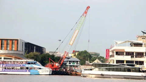 A tourist's ferries sails down the Chao Phraya River Stock Footage 272620030