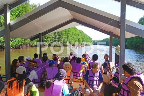 Tourists floating on pvc pipe raft in the lake of Laem Sing Stock Photos