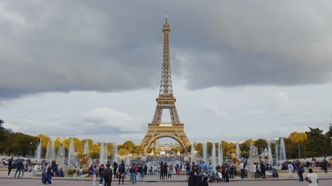 Tourists at the fountain at the Eiffel Tower Stock Footage 126644209