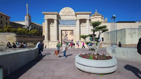 Tourists in front of Puerta del Puente, Cordoba, Andalusia, Spain - 4K Stock Footage 336867400