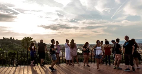 Tourists in front of the scene Stock Footage 74264731