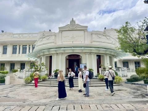 Tourists gathering in front of the Queen Sirikit Museum of Textiles entrance Stock Photos