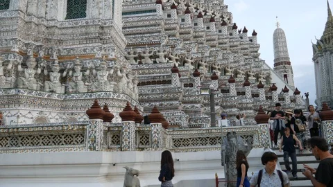 Tourists Getting around Temple of the Dawn, Bangkok Stock Footage 107541400