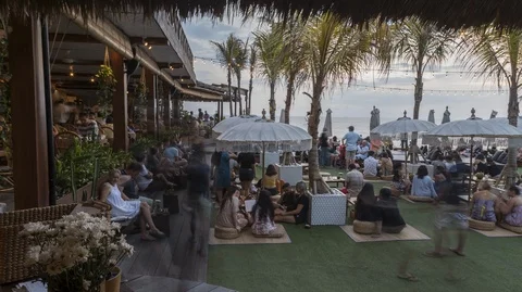 Tourists Having Drinks At The Beach Stock Footage 102124311