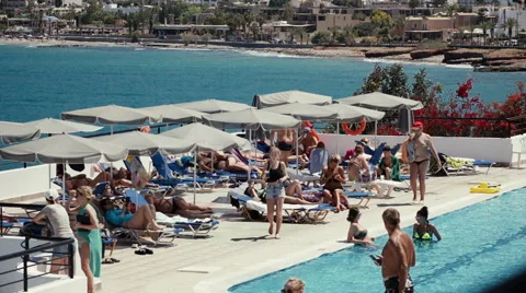 Tourists having fun by the pool. Stock Footage 64034752