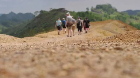Tourists Hike on Path in Mountains 스톡 동영상 67295605