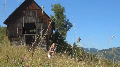 Tourists Hiking in Mountains, Mother and Child Climbing, Walking on Path, Chalet Stock Footage
