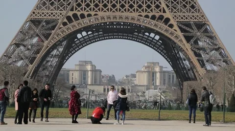 Tourists infront of The Eiffel Tower (Tour Eiffel) - Paris, France Stock Footage 61238132