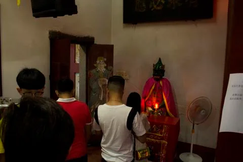 Tourists inside Chinese Temple during CNY. Stock Photos