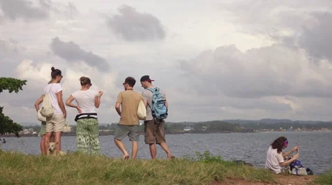 Tourists look at lagoon Stock Footage 58285476