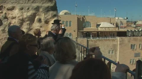 Tourists look at the Wailing Wall Stock Footage 10889490