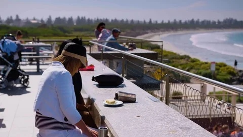Tourists looking out on harbour scene. Stock Footage 87849566