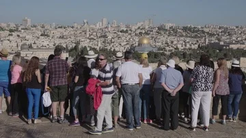 Tourists looking at the Temple Mount from Mount of Olives, part two Stock Footage 86114569