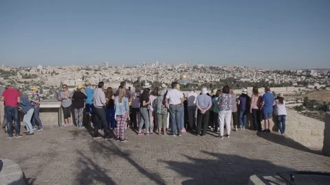 Tourists looking at the Temple Mount from Mount of Olives, part three Stock Footage 86115215