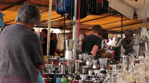 Tourists looking through a Vendor's Items  in Rome, Italy Stock Footage 36778062