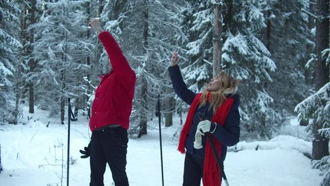 Tourists lost in the forest and catch a connection on the phone Stock Footage 129098396