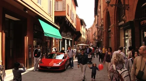 Tourists make travel photo at the busy pedestrian street in Bologna, Italy. 스톡 동영상 59791320