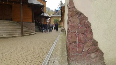 Tourists at Manyava Skete John the Baptizer Day Pilgrims Orthodox Monastery of Stock Footage 71646734
