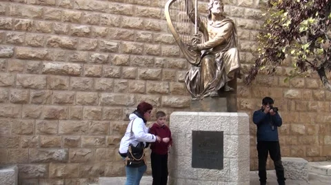 Tourists at a monument to king to David. Stock Footage 45544313
