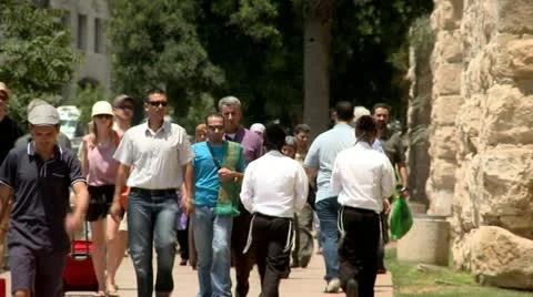 Tourists next to the Wall of Old Jerusalem 2 Stock Footage 18155517
