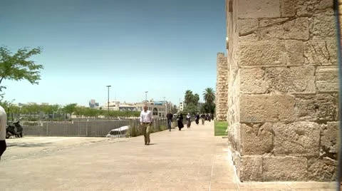 Tourists next to the Wall of Old Jerusalem 1 Stock Footage 18155770