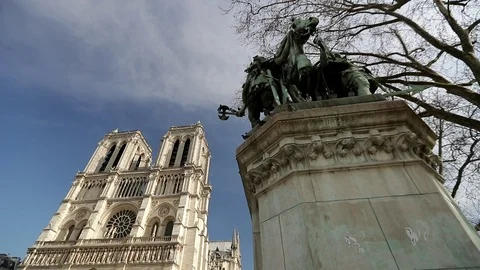 Tourists Notre-Dame de Paris. It is a medieval Catholic cathedral Paris, France Stock Footage 87968352