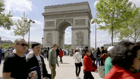 Tourists outside Arc de Triomphe - people walking toward monument Paris France Stock Footage 93815462