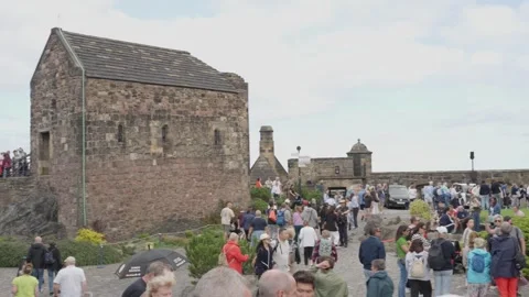 Tourists outside St Margaret’s Chapel at Edinburgh Castle Stock Footage 345120853