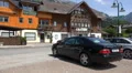 Tourists parking at Grundlsee village information center Austria HD Footage