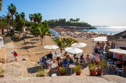 Tourists on Playa El Duque Stock Photos