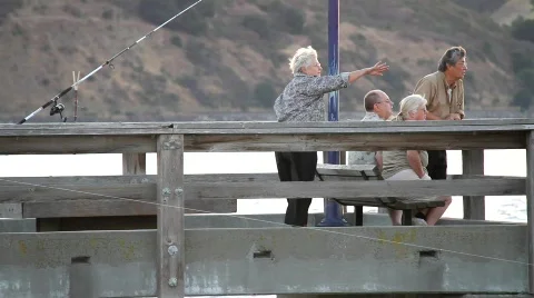 Tourists Pointing on Dock Stock Footage 844121