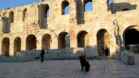 Tourists posing for photos, in front of Ancient Theater Stock Footage 33741055