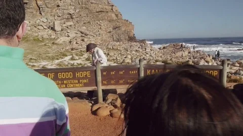 Tourists posing at the sign 'Cape of Good Hope' Stock Footage 75417402