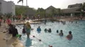 Tourists preparing for a game at Playa Blanca Resort, Panama 4k or 4k+ Resolution