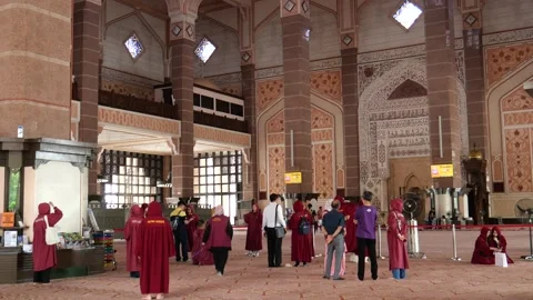 Tourists at Putra Mosque (Red Mosque), Malaysia. Stock Footage 266156884
