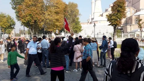 Tourists in queue to enter Hagia Sophia Ayasofya museum in Sultanahmet, Istanbul Stock Footage 119082548
