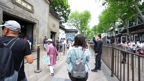 Tourists queuing to enter the Humble Administrator's Garden in Suzhou Stock Footage 334699498