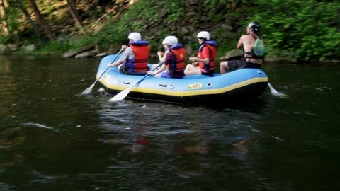 Tourists rafting in the river Stock Footage 103793299